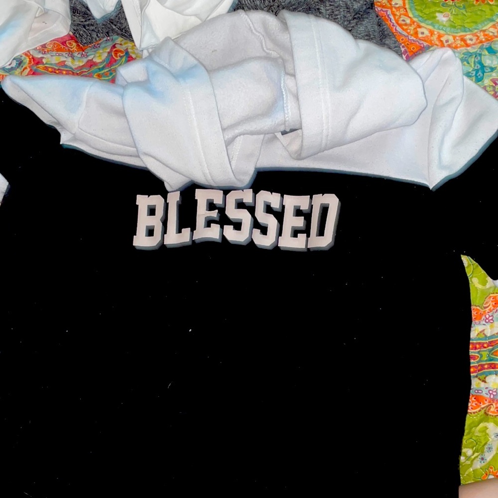 A black and white large Rue21 pullover